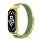 Gold smartwatch with green nylon mesh watch band