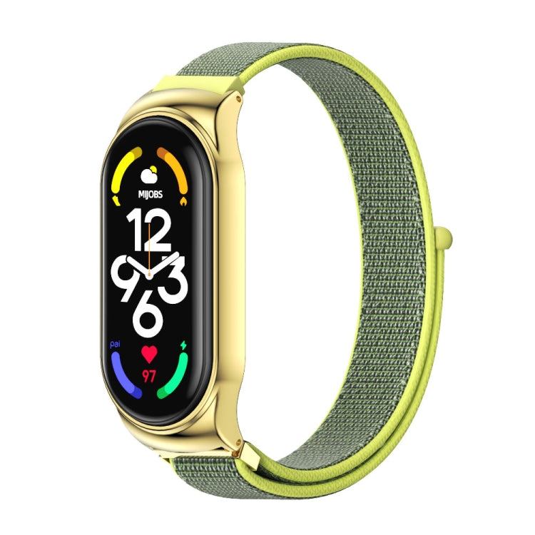 Gold smartwatch with green nylon mesh watch band