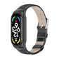 Genuine leather watch band with metal case, black strap and dark frame.