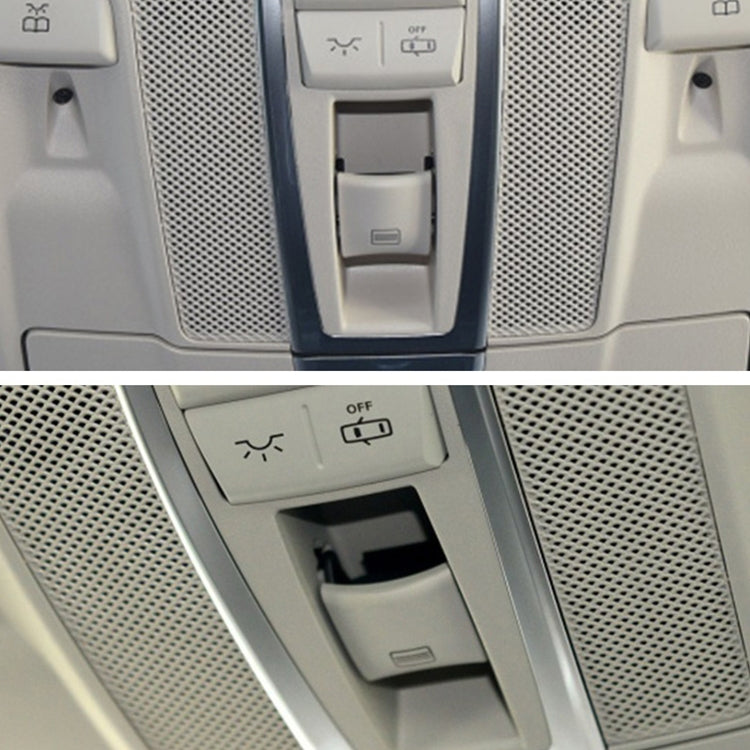 Installed car dome light switch button on overhead console next to sunroof controls