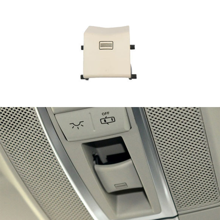 Ivory cream sunroof dome light switch button with vent-style icon and side mounting tabs