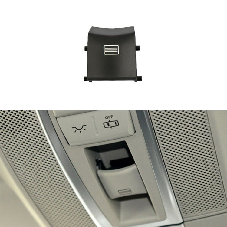 Car dome light switch button, flat black, with small ridged lamp icon