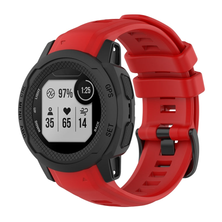 Silicone sports watch band in red, with adjustable buckle and vented strap segments