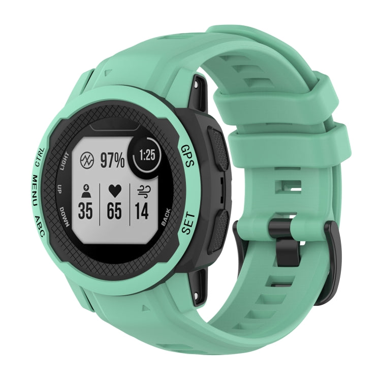 Silicone sports watch band in light teal, with adjustable buckle and vented strap