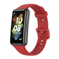 Silicone watch band with red strap and buckle, adjustable holes for fit
