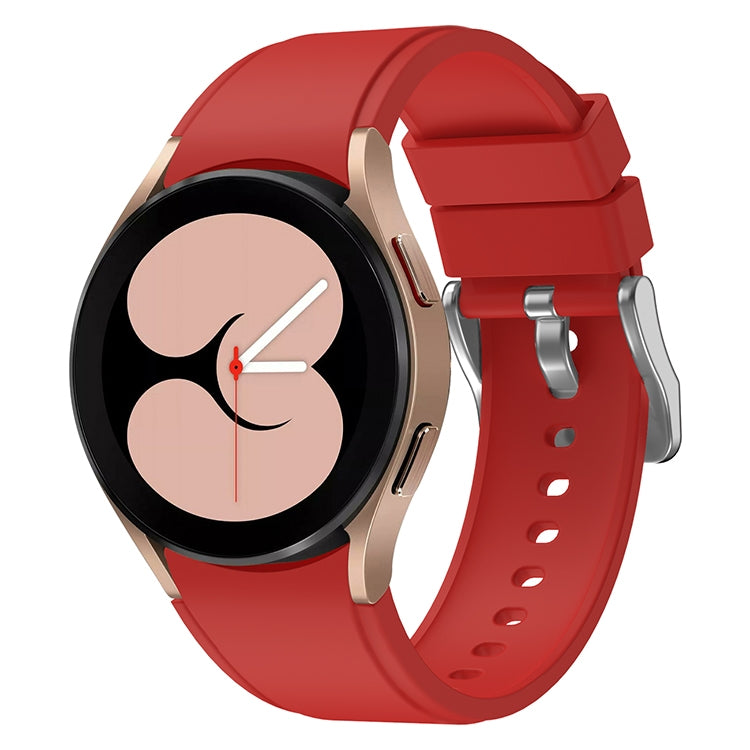 Red silicone watch band with metal clasp and perforated strap holes