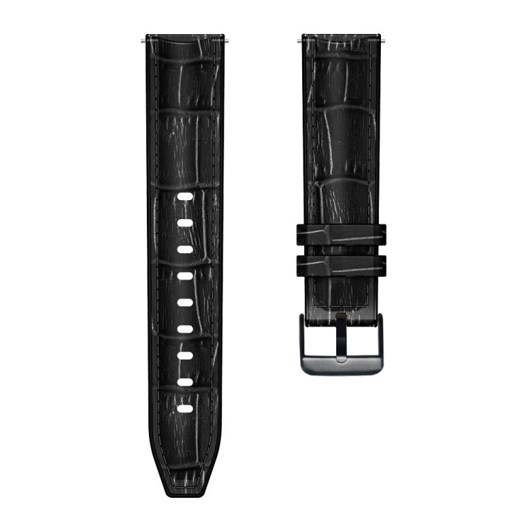Black textured silicone watch band showing front and underside with metal clasp and holes