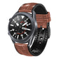 Brown textured silicone watch band with metal buckle and strap holes, side view