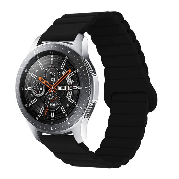 Black silicone watch band with reverse buckle and magnetic clasp, segmented links.