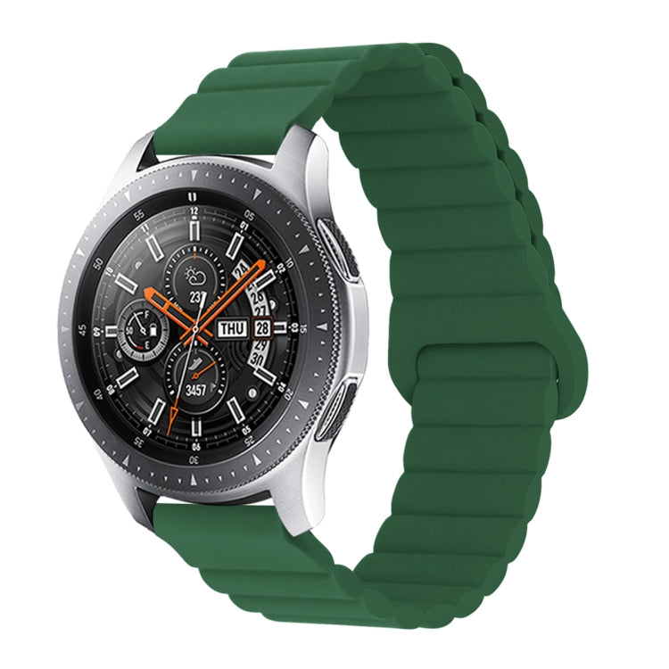 Green silicone watch band with reverse buckle and magnetic clasp, segmented links.