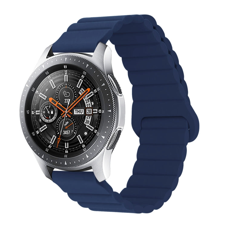 Midnight blue silicone watch band with reverse buckle and magnetic clasp, segmented links.