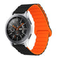 Orange silicone watch band with reverse buckle and magnetic clasp, segmented links.