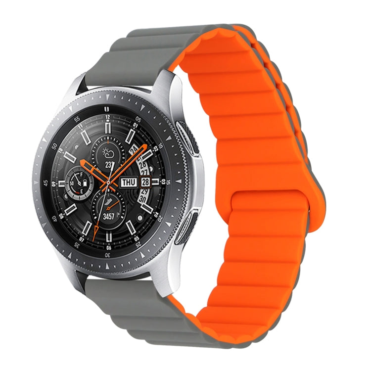 Grey and orange two-tone silicone watch band with reverse buckle and magnetic clasp.