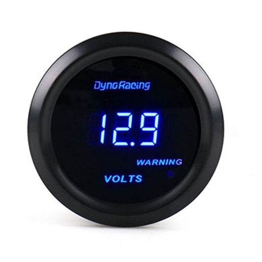 Blue digital voltmeter gauge with DynoRacing logo, black bezel; display shows 18.9