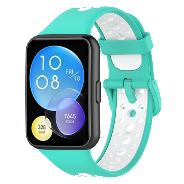Two-color breathable silicone watch band with teal strap and white perforated underside