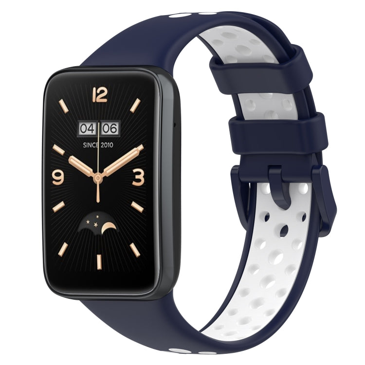 Two-color breathable silicone watch band with perforations, dark blue and white, buckle clasp.