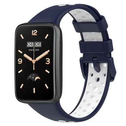 Two-color breathable silicone watch band with perforations, dark blue and white, buckle clasp.