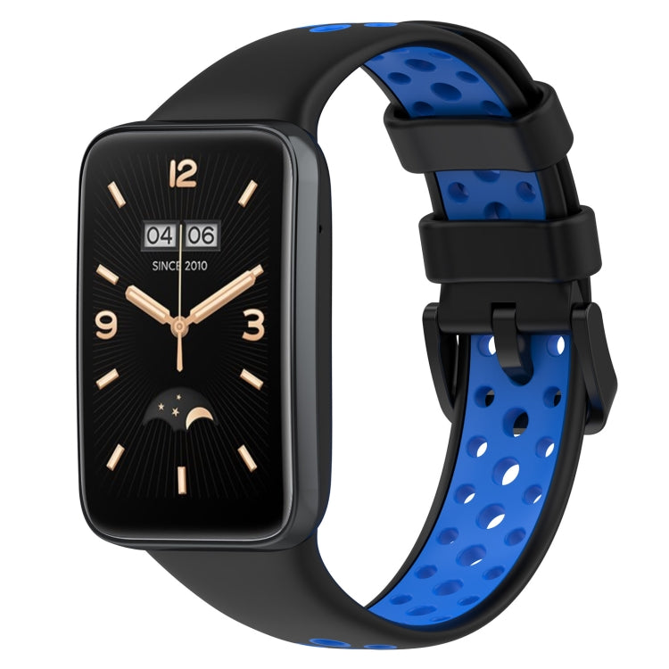 Two-color breathable silicone watch band with perforations, black and blue, buckle clasp.