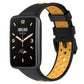 Two-color breathable silicone watch band with perforations, black and yellow-orange, buckle clasp.