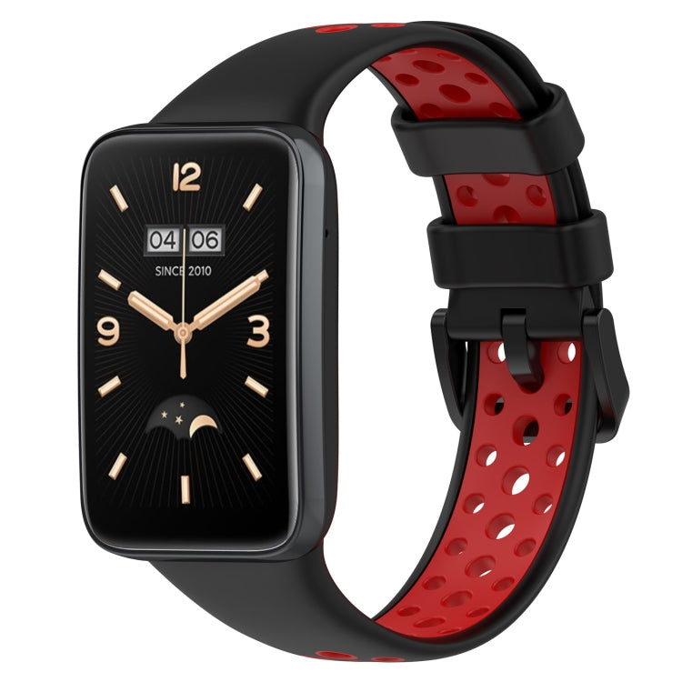 Two-color breathable silicone watch band with perforations, black and red, buckle clasp.