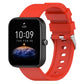 Red silicone watch band with metal buckle and adjustment holes, shown with matching smartwatch.