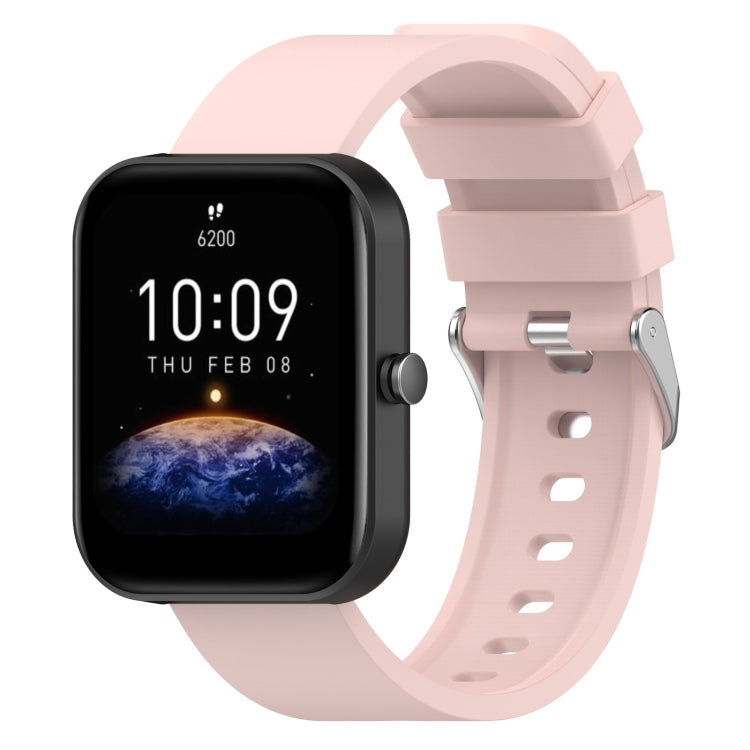 Light pink silicone watch band with metal buckle and perforated strap holes