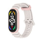 Two-color watch band with light pink strap and matching pink connector for fitness tracker