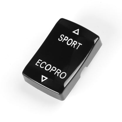 Black gear mode switch button with SPORT and ECOPRO labels