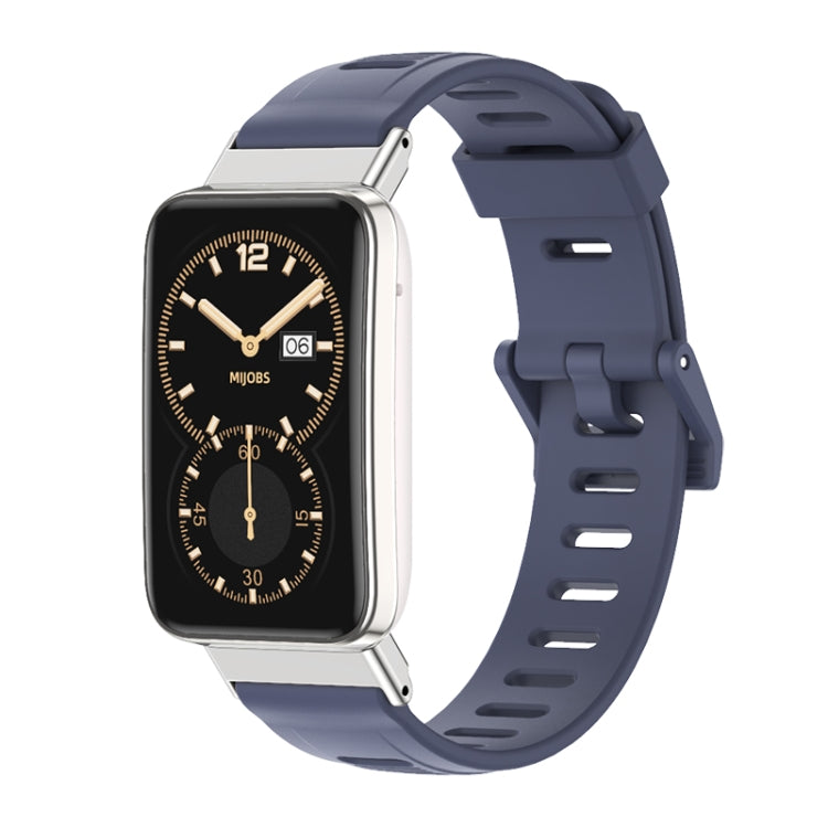 TPU watch band with perforated holes and silver-toned case, dark blue strap