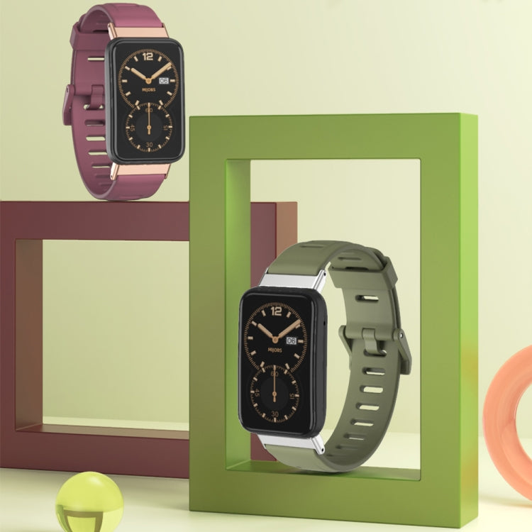 Wine-red TPU watch band with flat holes and metal buckle, on smartwatch case