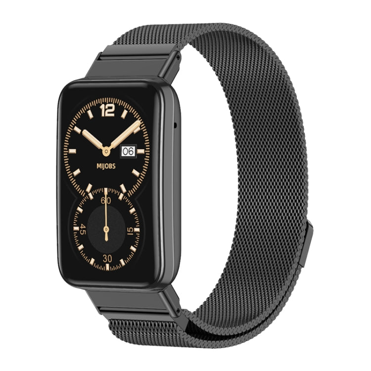Magnetic stainless steel watch band with dark mesh strap and metal clasp, paired with watch