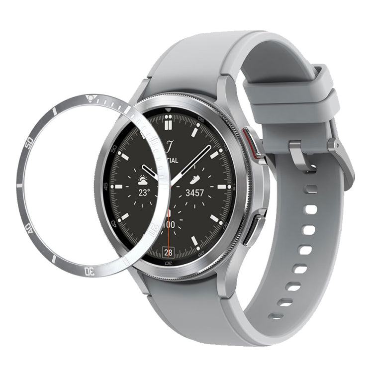 Silver bezel ring with minute markers shown fitted around a smartwatch case