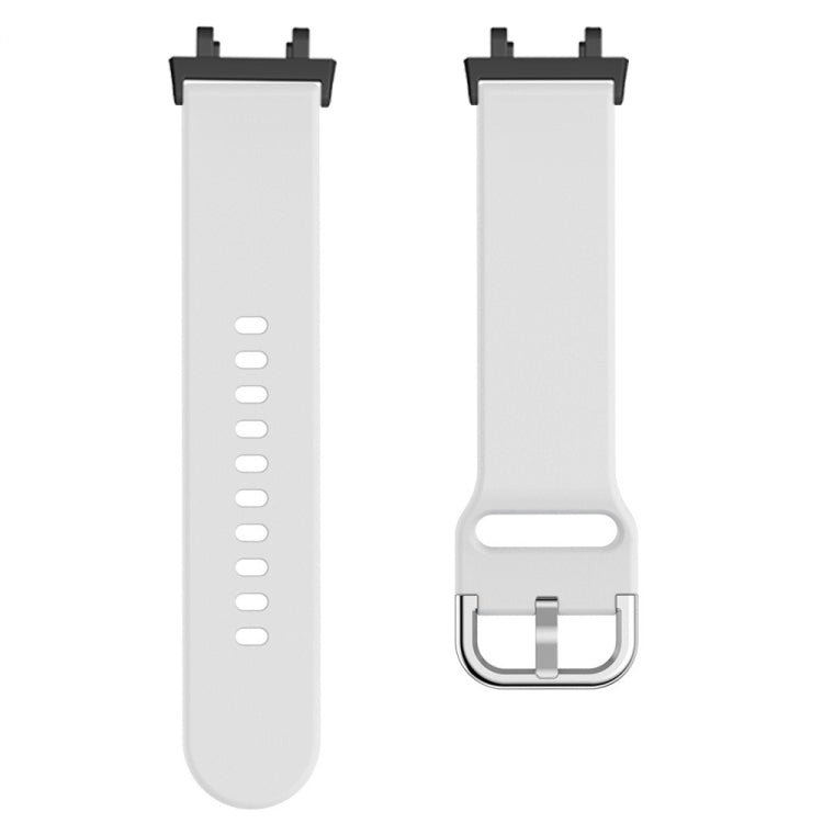 Silicone watch band with reverse buckle, white, with clasp and strap holes.