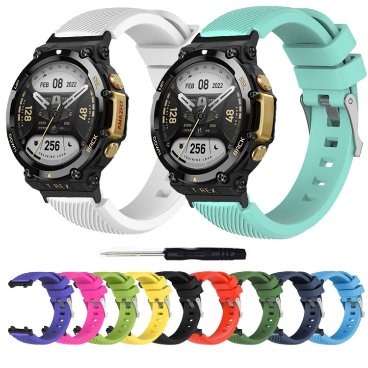 Assorted silicone watch bands in multiple colors with ribbed texture and buckles