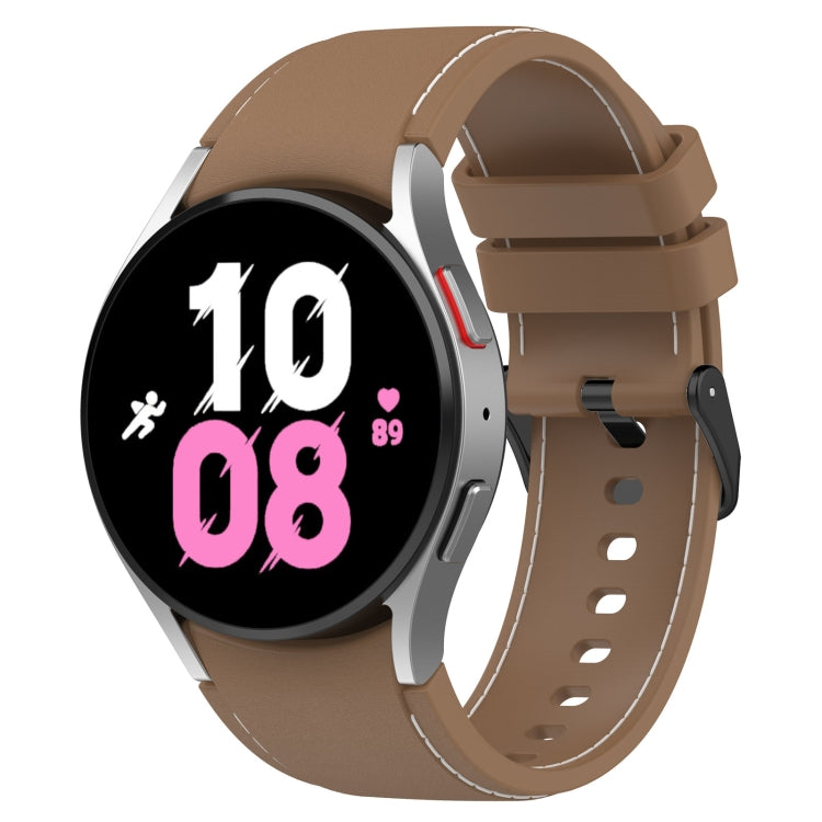 Leather-textured silicone watch band, brown with green-toned edge stitching.