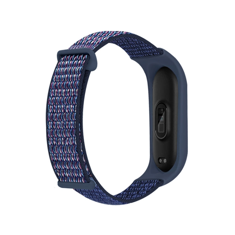 Nylon two-section loop watch band with multicolor woven strap and deep blue watch case