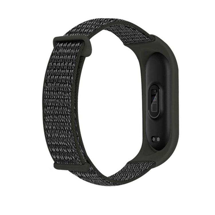 Nylon two-section loop watch band with textured dark gray woven strap and black watch case