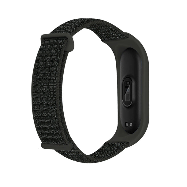 Nylon two-section loop watch band in dark black, textured fabric with clasp holes
