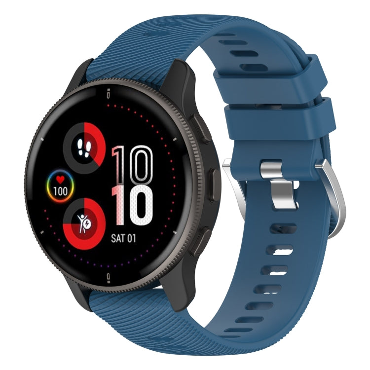Blue cross-textured silicone smartwatch band with perforated clasp and metal adjuster