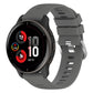 Dark gray cross-textured silicone smartwatch band with perforated clasp and metal adjuster