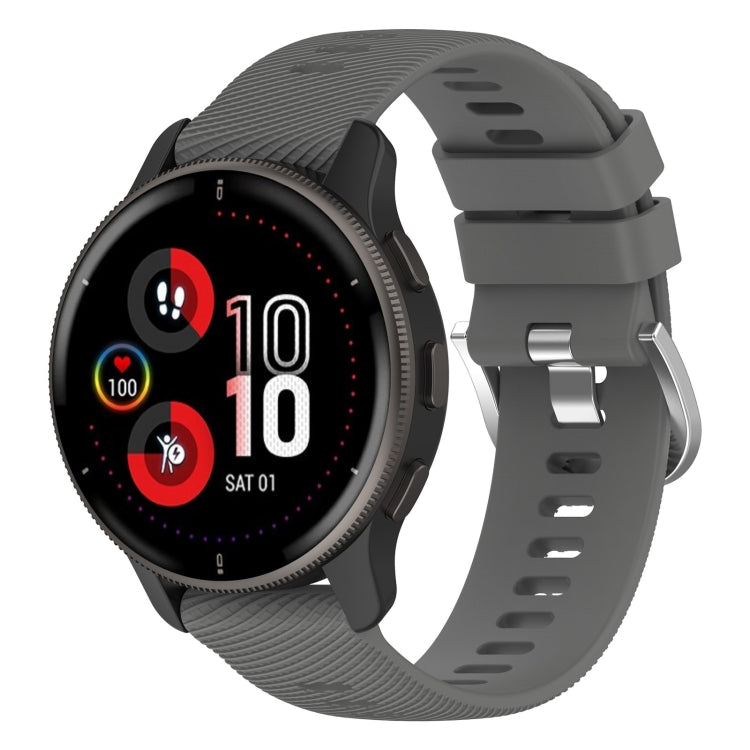 Dark gray cross-textured silicone smartwatch band with perforated clasp and metal adjuster