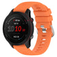 Orange cross-textured silicone watch band with secure clasp, 18mm width.