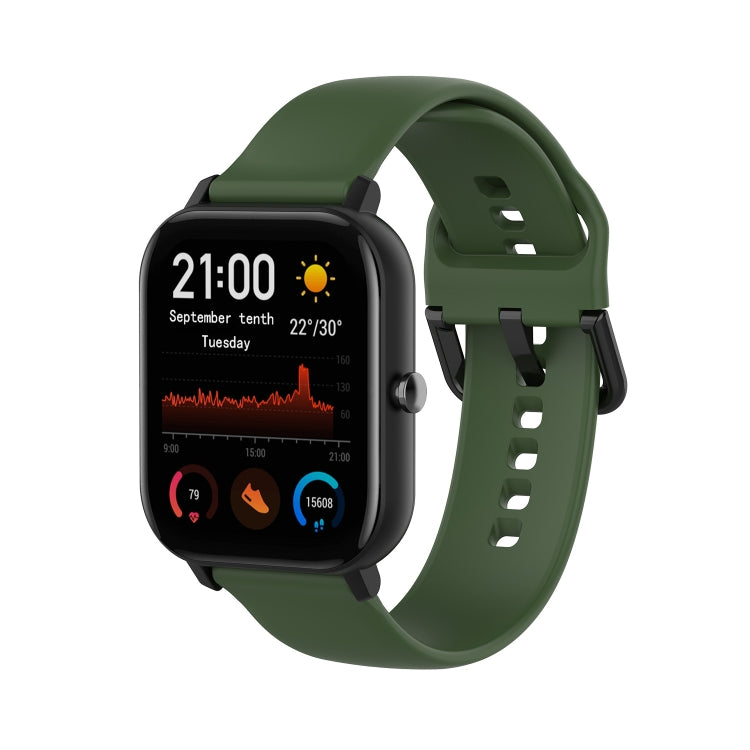 Army green soft silicone smartwatch band with adjustable holes and clasp.