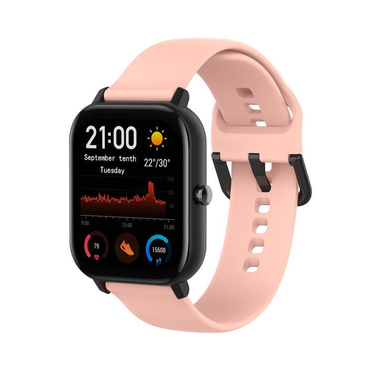 Light pink soft silicone watch band with perforated holes and buckle clasp