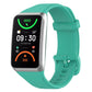 Teal soft silicone watch band with adjustable holes and buckle clasp.