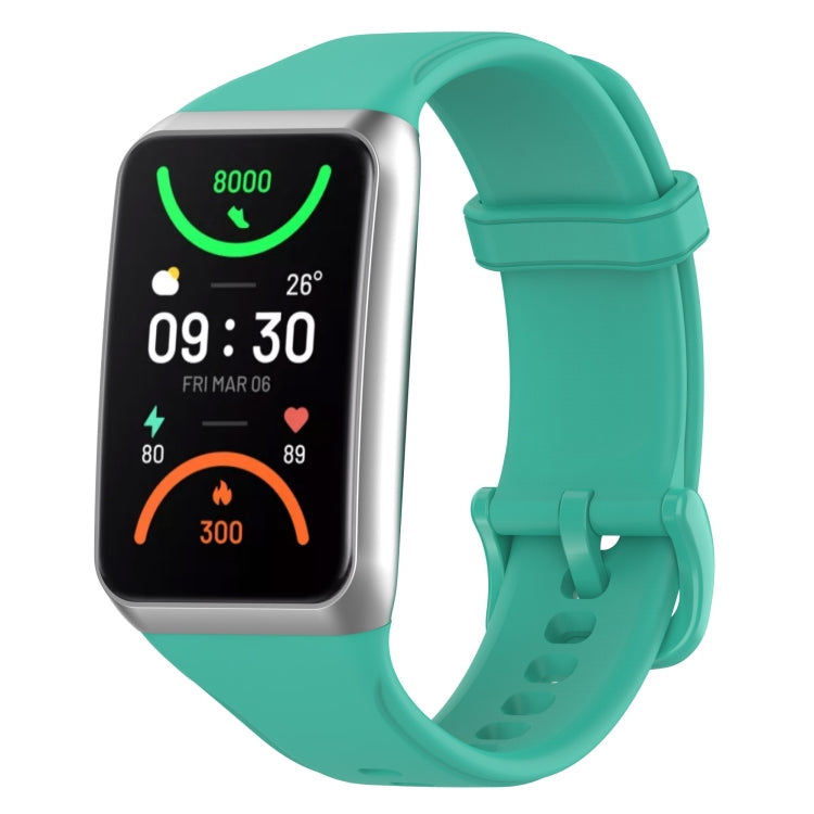 Teal soft silicone watch band with adjustable holes and buckle clasp.