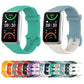 Multi-color soft silicone watch band set, with teal and light blue bands shown.