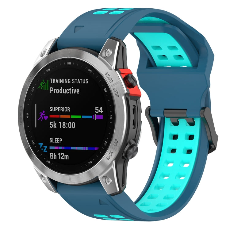 Two-color silicone watch band with dark blue outer strap and teal perforated inside
