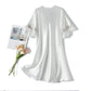 Loose V-neck mid-sleeve nightdress in white with scalloped lace neckline and sleeves