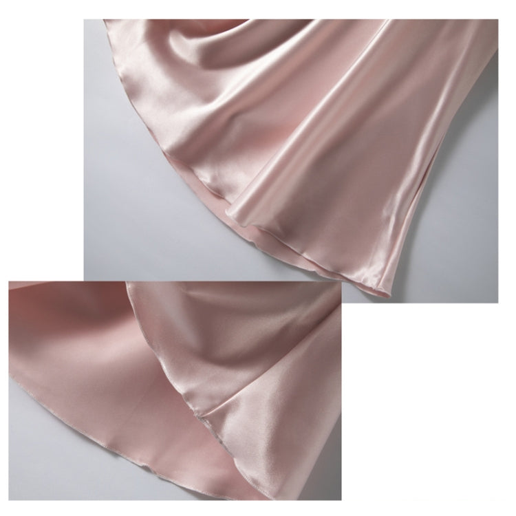 Hem and sleeve edge close-up on blush pink satin nightdress